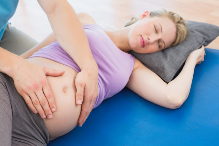 ryggmassasje under graviditet