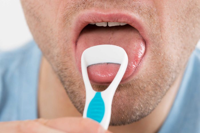 hvordan å rengjøre tungen